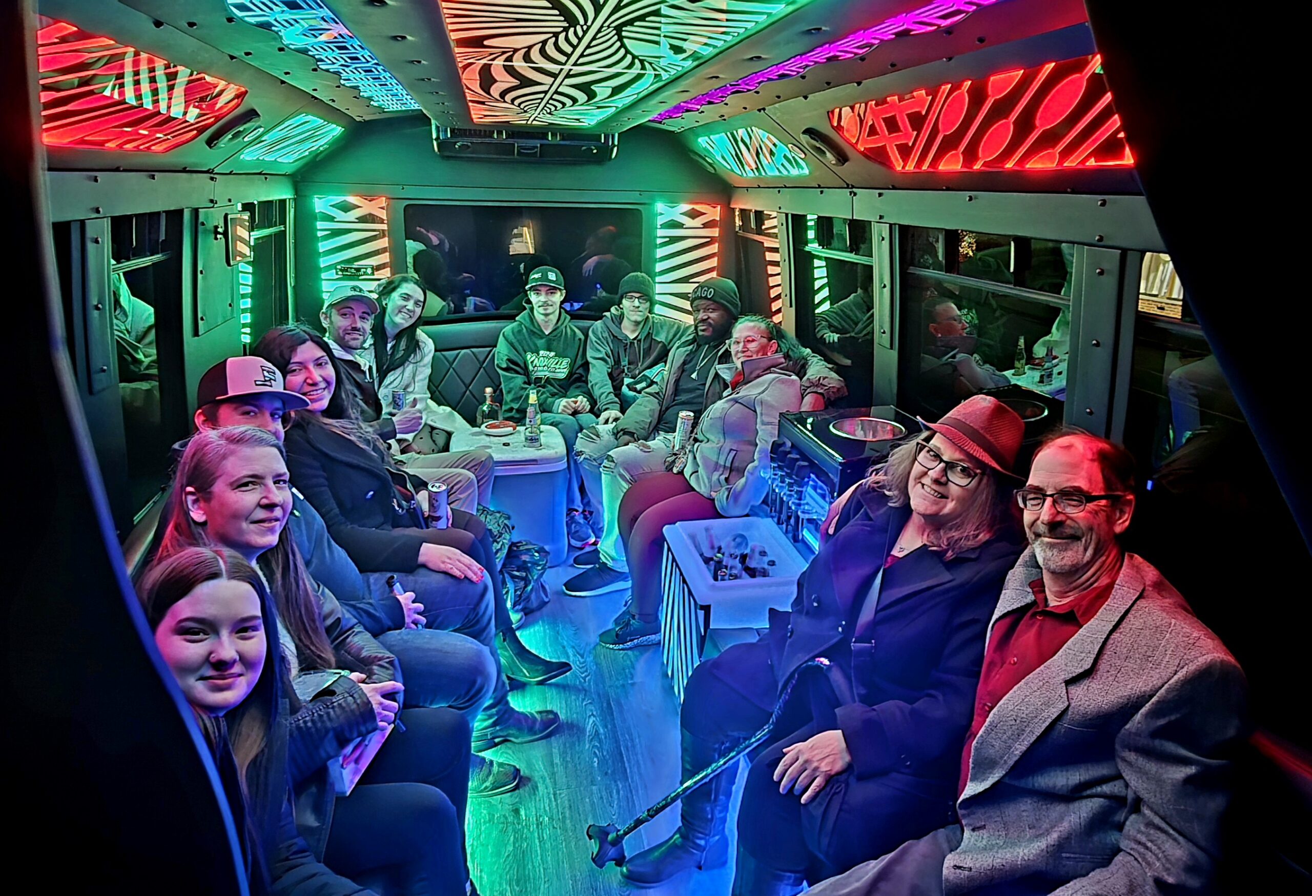 Plush, comfortable wraparound seating inside the Limo Lux party bus